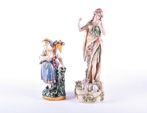 Lot 342 - A Royal Dux porcelain figure of a shepherdess,...