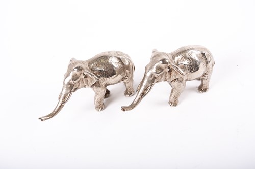 Lot 238 - A pair of Japanese silvered bronze elephants,...