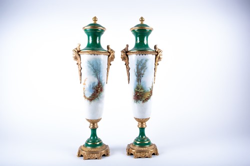 Lot 213 - A pair of Sevres style porcelain vases and...