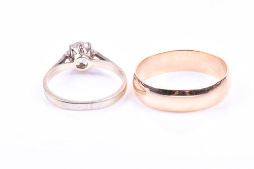 Lot 636 - A yellow metal and cubic zirconia ring, set...
