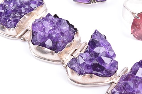 Lot 502 - A silver and amethyst bracelet set with six...