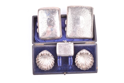 Lot 501 - A pair of silver salt dishes of scalloped...