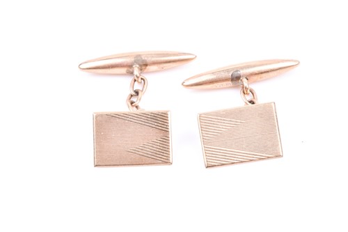 Lot 706 - A pair of 9ct yellow gold cufflinks, with...