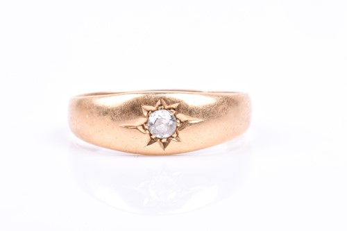 Lot 791 - An 18ct yellow gold gents ring, bright-cut set...