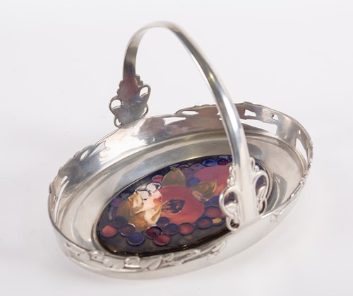 Lot 236 - A Liberty & Co pewter loop-handled oval tray,...