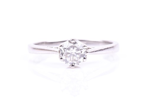 Lot 866 - An 18ct white gold and solitaire diamond ring,...