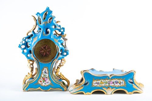 Lot 329 - A 19th-century French porcelain chiming mantle...