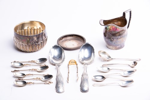 Lot 512 - A mixed group of small silver items to include...