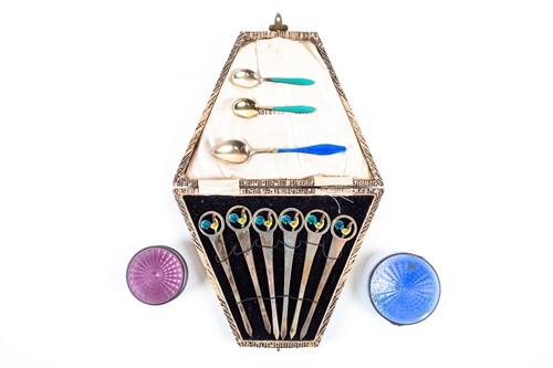 Lot 535 - A set of six silver and enamel cocktail sticks...
