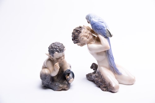 Lot 212 - Two Royal Copenhagen figures: a faun with a...