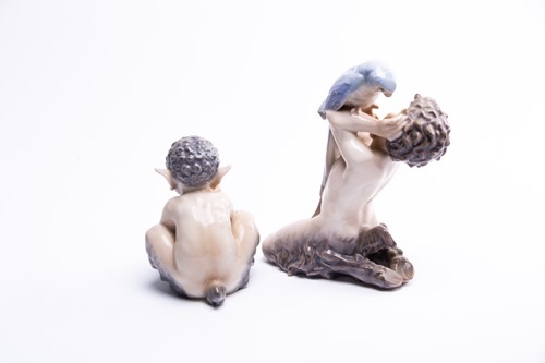 Lot 212 - Two Royal Copenhagen figures: a faun with a...
