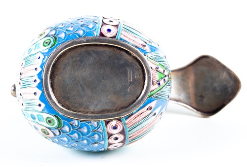 Lot 552 - A Russian silver and enamel kovsh, modelled as...