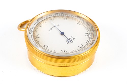 Lot 286 - A 19th century gilt metal pocket barometer by...