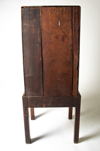 Lot 103 - A small George III mahogany chest on stand,...