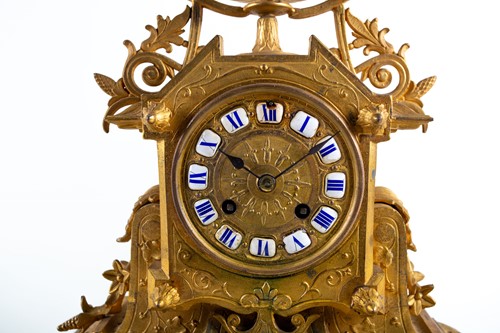 Lot 320 - A Victorian gilt spelter mantel clock, the...