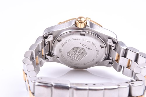 Lot 357 - A Tag Heuer ladies wristwatch, the gilt dial...