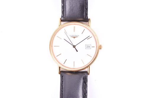 Lot 488 - A Longines gold plated wristwatch, the white...