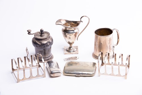 Lot 494 - A mixed group of small silver items to include...