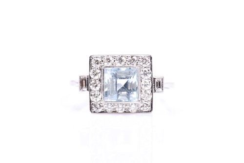 Lot 665 - A platinum, diamond, and aquamarine ring, set...