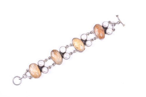 Lot 485 - A silver, citrine, and blister pearl bracelet,...