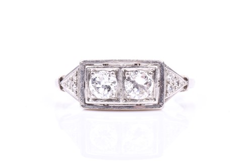 Lot 690 - A platinum and diamond ring, the two round...