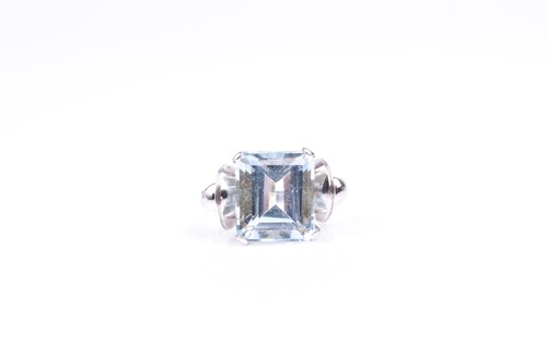 Lot 631 - An 18ct white gold and aquamarine cocktail...