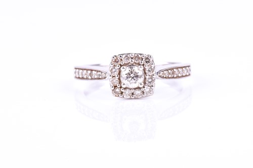 Lot 713 - A diamond cluster ring, the cushion shaped...