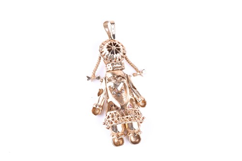 Lot 411 - An articulated 9ct gold rag doll pendant, the...