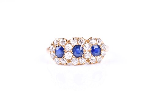 Lot 471 - A sapphire and diamond triple cluster half...