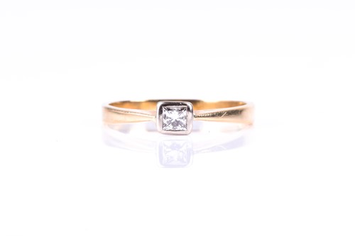 Lot 683 - A single stone diamond ring, the princess cut...