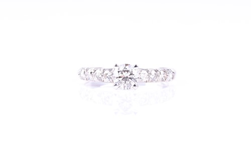 Lot 820 - A single stone diamond ring, the round...