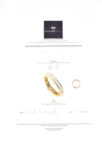 Lot 473 - A full hoop diamond eternity ring, the round...