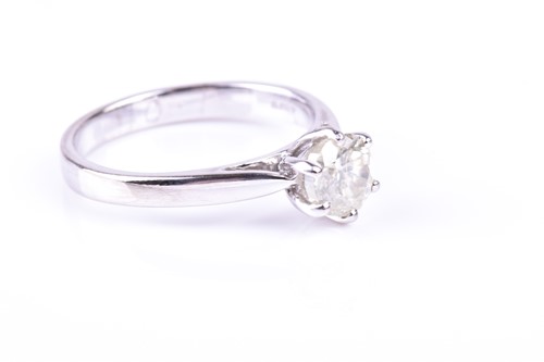 Lot 743 - A single stone diamond ring, the round...