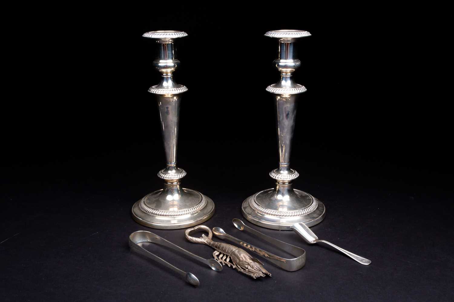 Lot 153 - A pair of silver candlesticks, Sheffield 1976,...