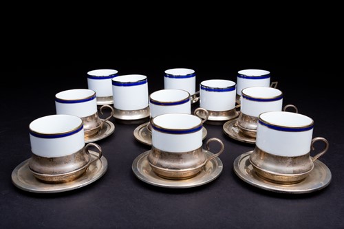 Lot 55 - Eleven Italian porcelain and silver mounted...