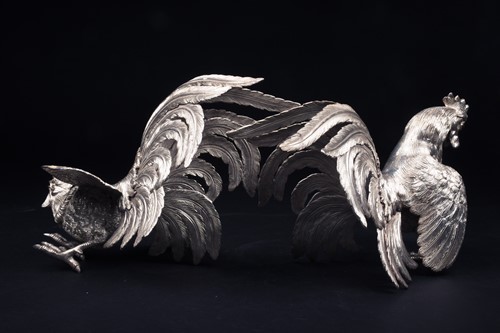 Lot 41 - A pair of silver fighting cocks, realistically...