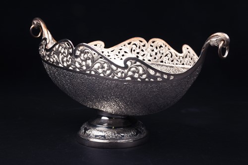 Lot 94 - A Continental white metal bowl of boat form,...