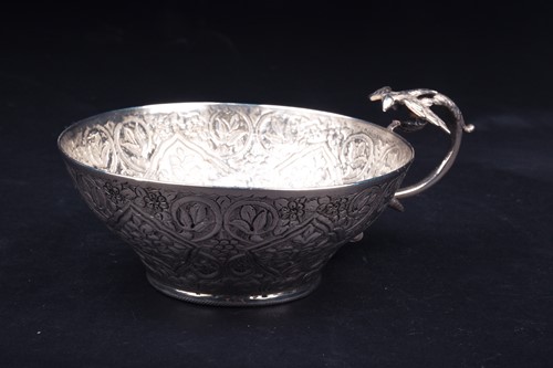Lot 143 - A Continental white metal embossed bowl, the...