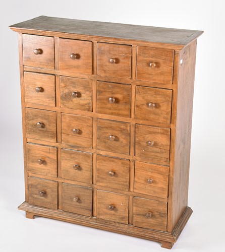 Lot 136 - A teak apothecary type chest drawers, the top...