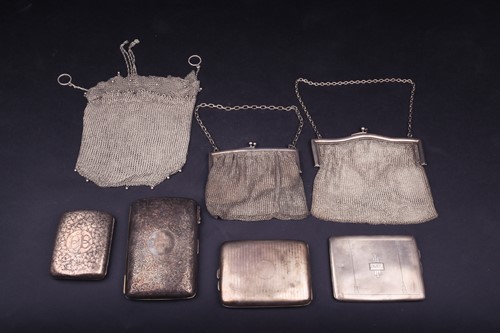 Lot 108 - A collection of four silver cigarette cases,...