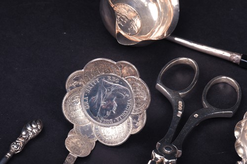 Lot 150 - A mixed group of silver and white metal items,...