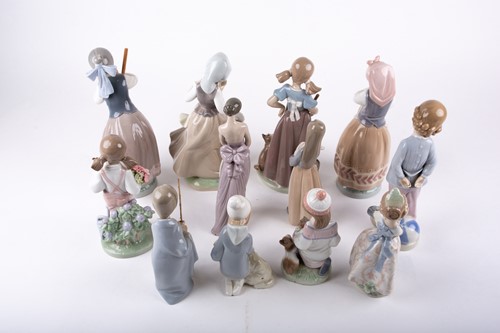 Lot 329 - A group of twelve assorted Lladro porcelain...