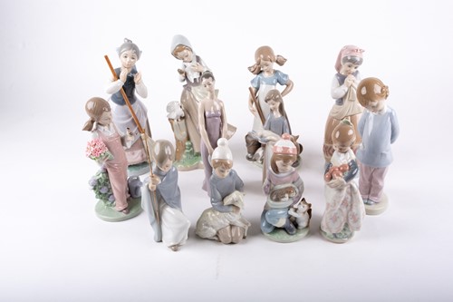 Lot 329 - A group of twelve assorted Lladro porcelain...