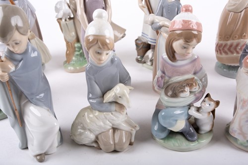 Lot 329 - A group of twelve assorted Lladro porcelain...