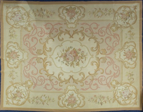 Lot 205 - A large woven Aubusson style rug, 20th century,...