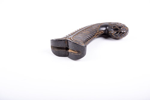 Lot 257 - A Mughal style carved jade dagger handle, the...