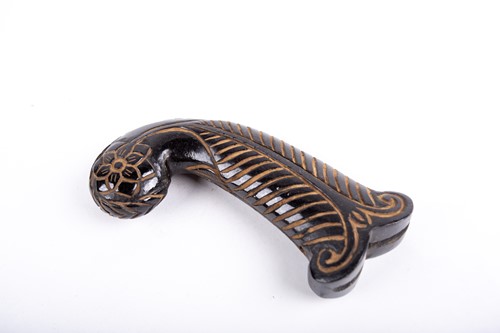 Lot 257 - A Mughal style carved jade dagger handle, the...