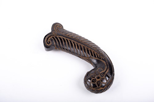 Lot 257 - A Mughal style carved jade dagger handle, the...