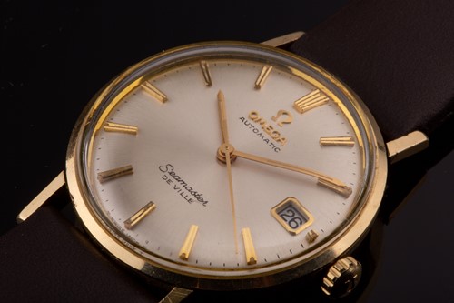 Lot 193 - Omega. A gilt stainless steel automatic...