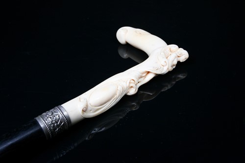 Lot 433 - A Continental carved ivory walking cane, 19th...